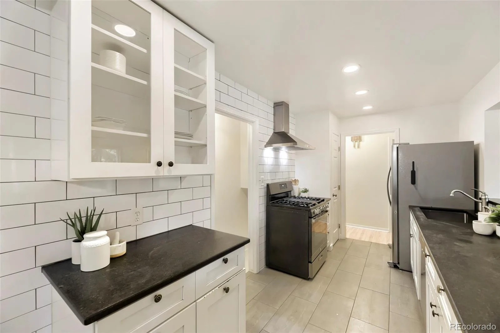 5671 E Bates Avenue Denver CO 80222 MLS #REC2632929 06112026171212 1600 8