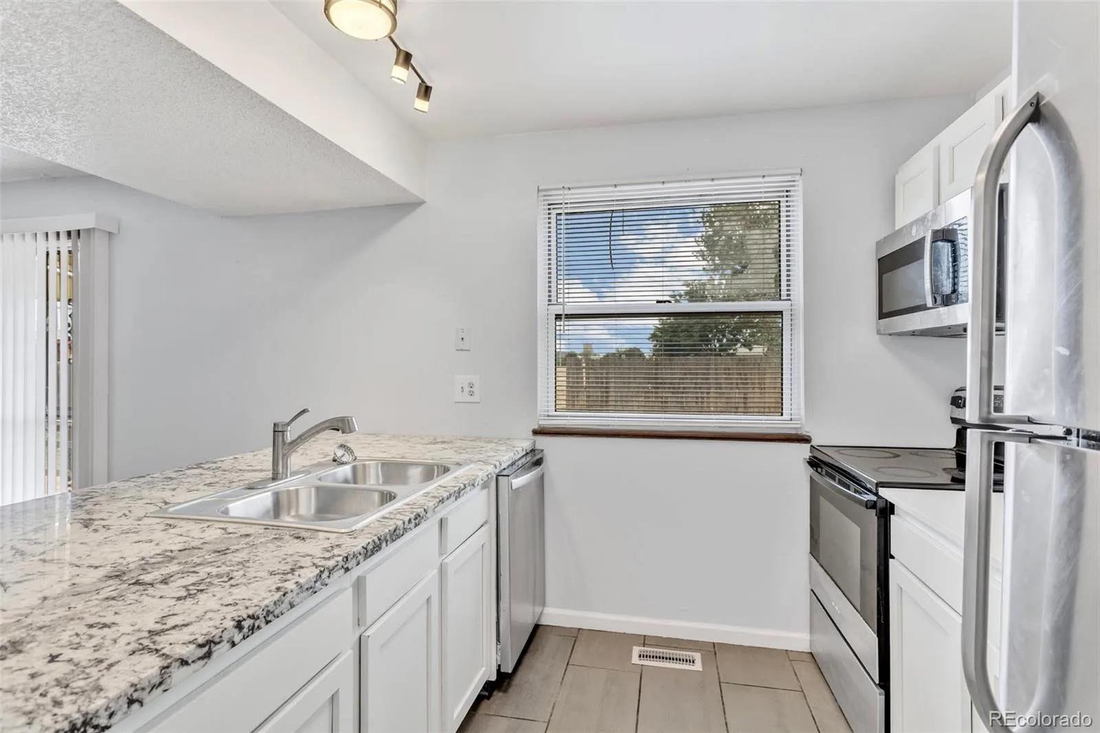 15084 E Andrews E Drive Denver CO 80239 | MLS #REC2842521 09232026084505 1600 10