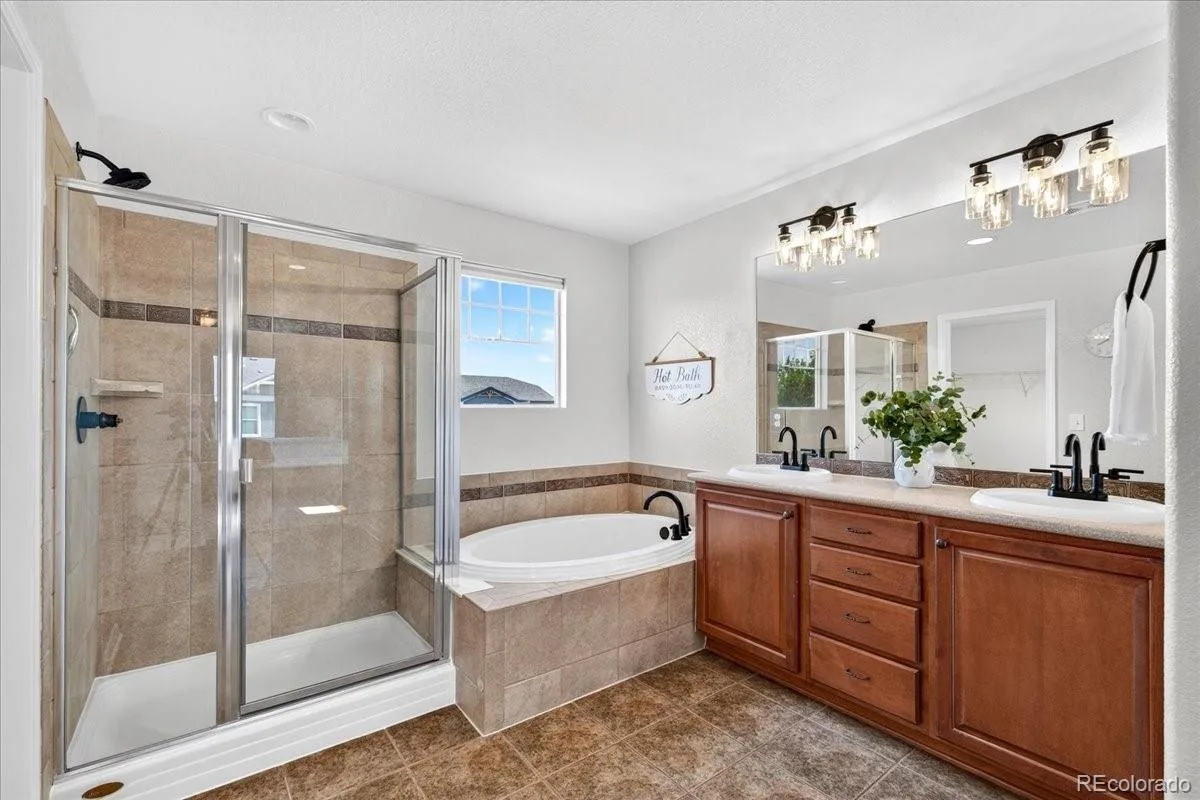 12975 E 107th Place Commerce City CO 80022 | MLS #REC2870574 08302026221636 1200 26