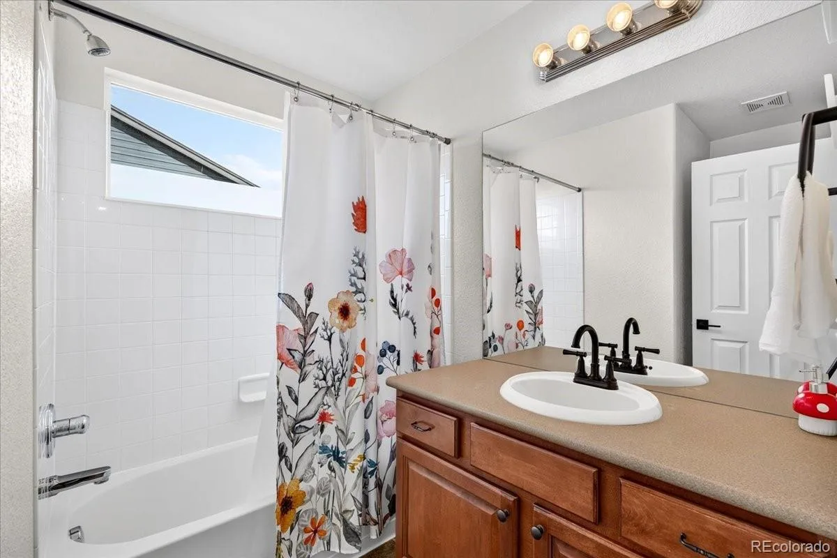 12975 E 107th Place Commerce City CO 80022 | MLS #REC2870574 08302026221636 1200 29