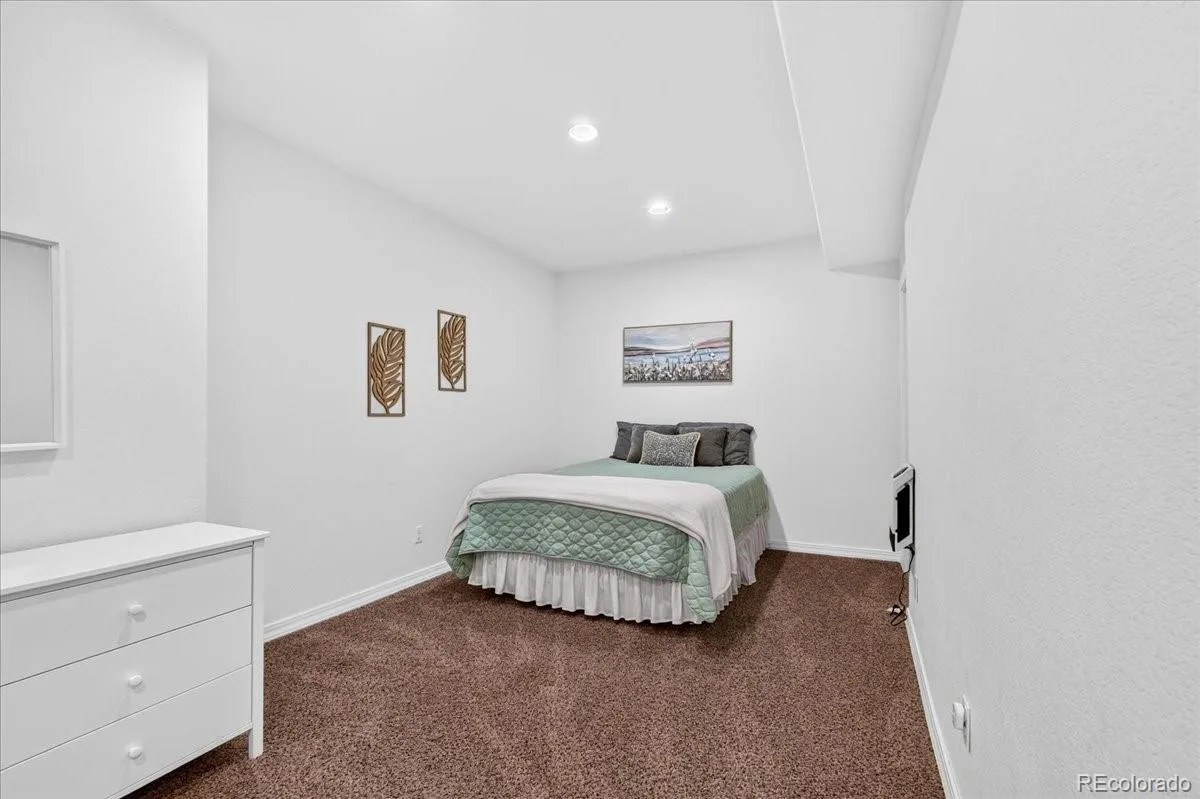 12975 E 107th Place Commerce City CO 80022 | MLS #REC2870574 08302026221636 1200 32