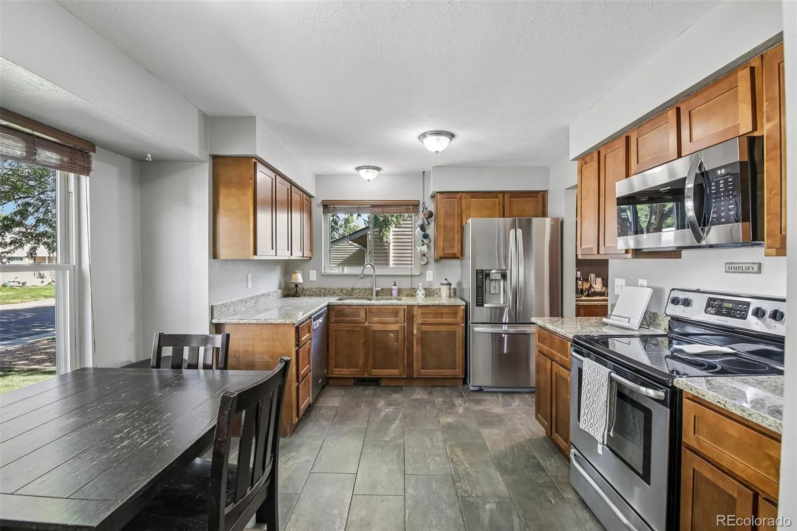 7524 Benton Street Arvada CO 80003 | MLS #REC2892030 07302026034634 1600 11