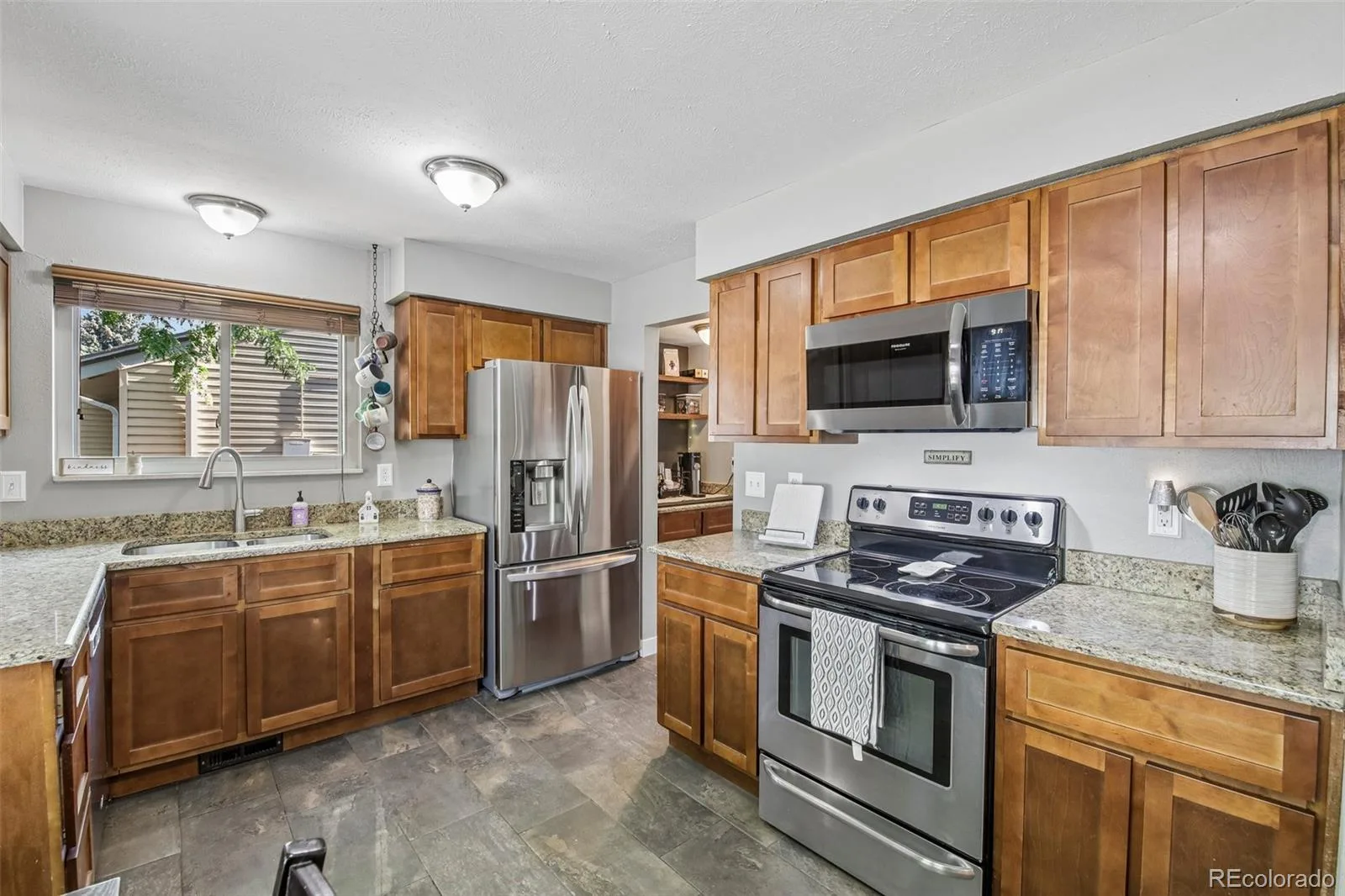 7524 Benton Street Arvada CO 80003 | MLS #REC2892030 07302026034634 1600 12