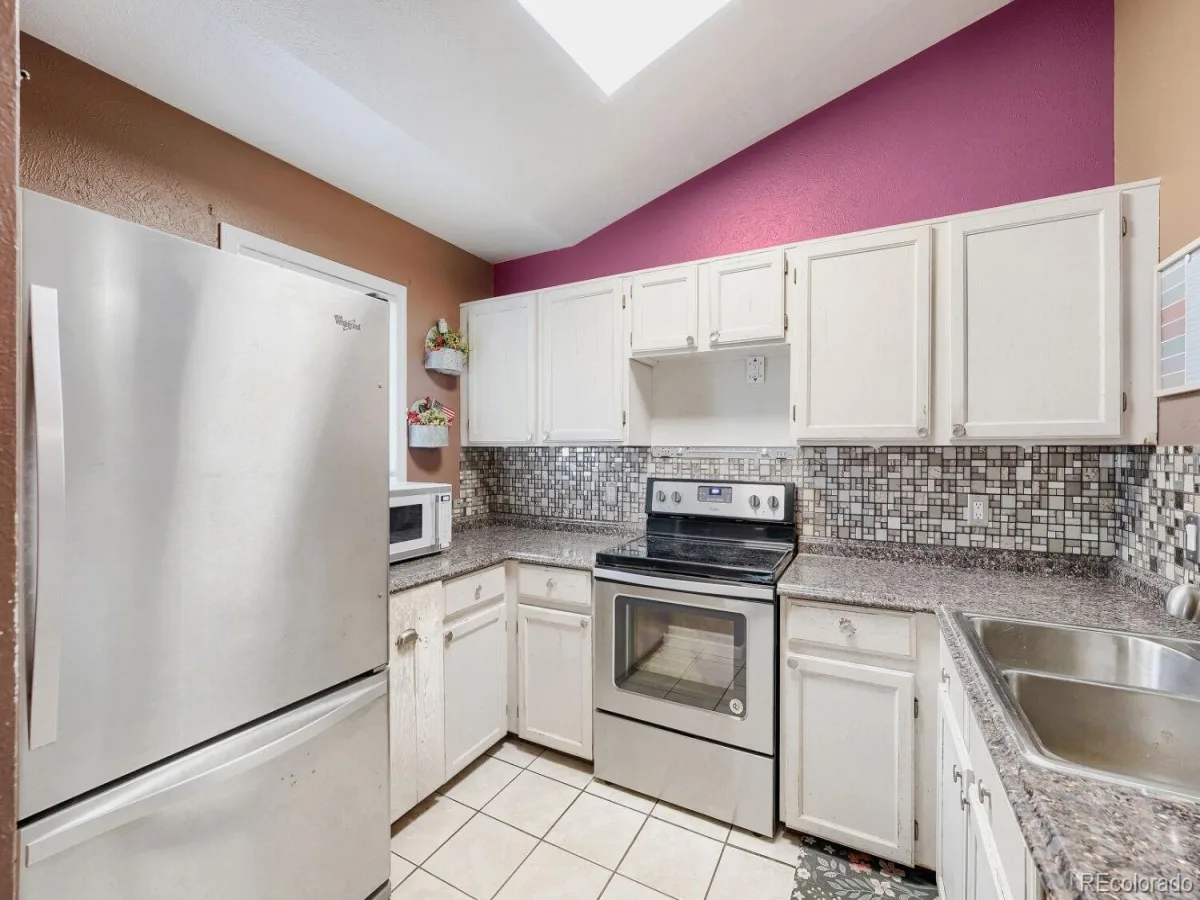 19073 E 16th Avenue Aurora CO 80011 | MLS #REC2975338 07072026165232 1200 5