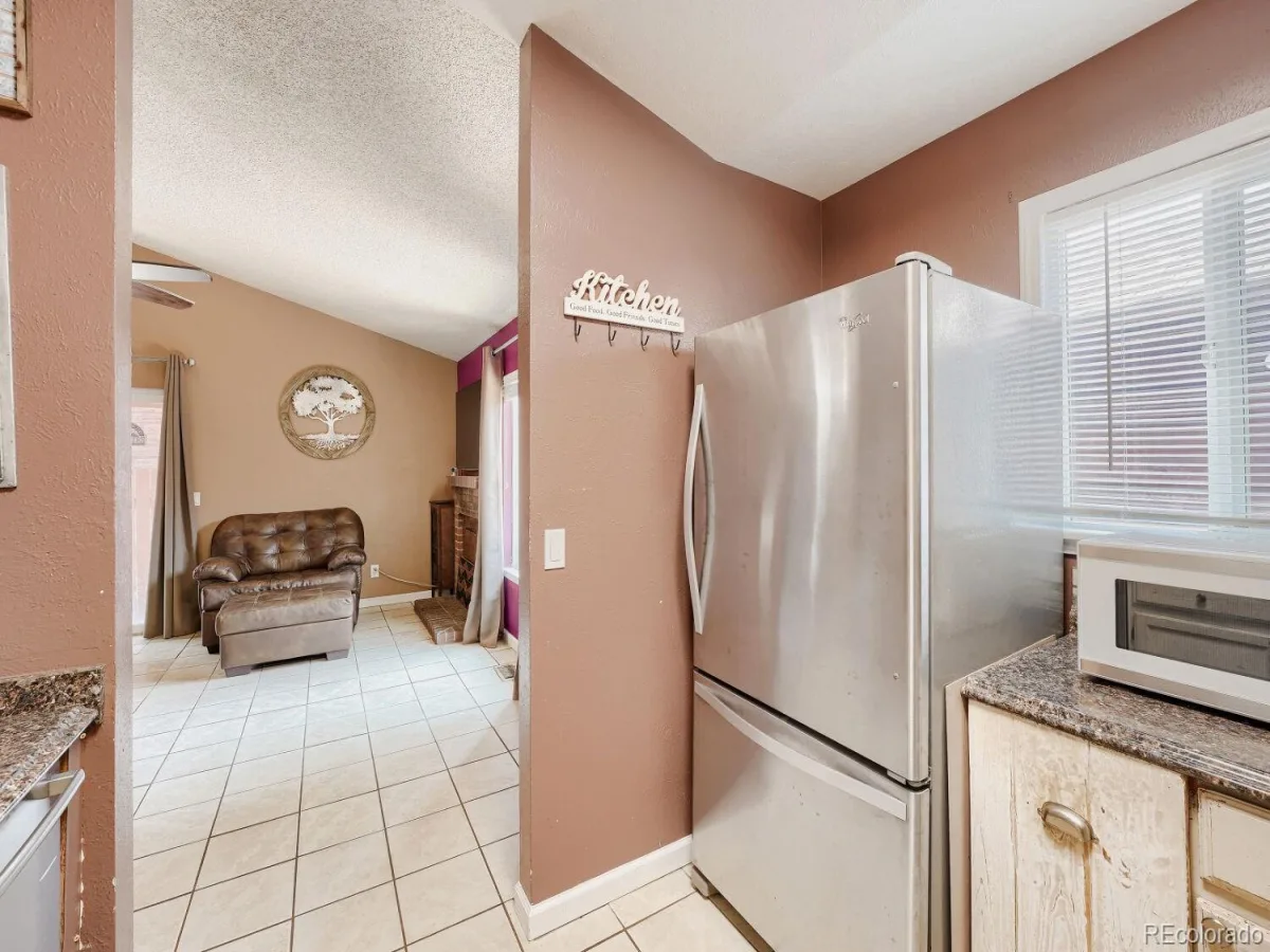 19073 E 16th Avenue Aurora CO 80011 | MLS #REC2975338 07072026165232 1200 6