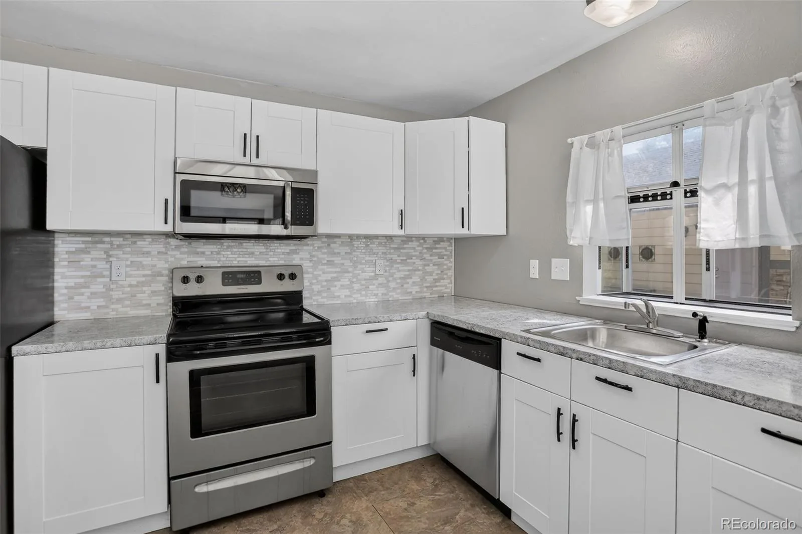 9816 W Friend Place Littleton CO 80128 | MLS #REC2994861 06242026225826 1600 14