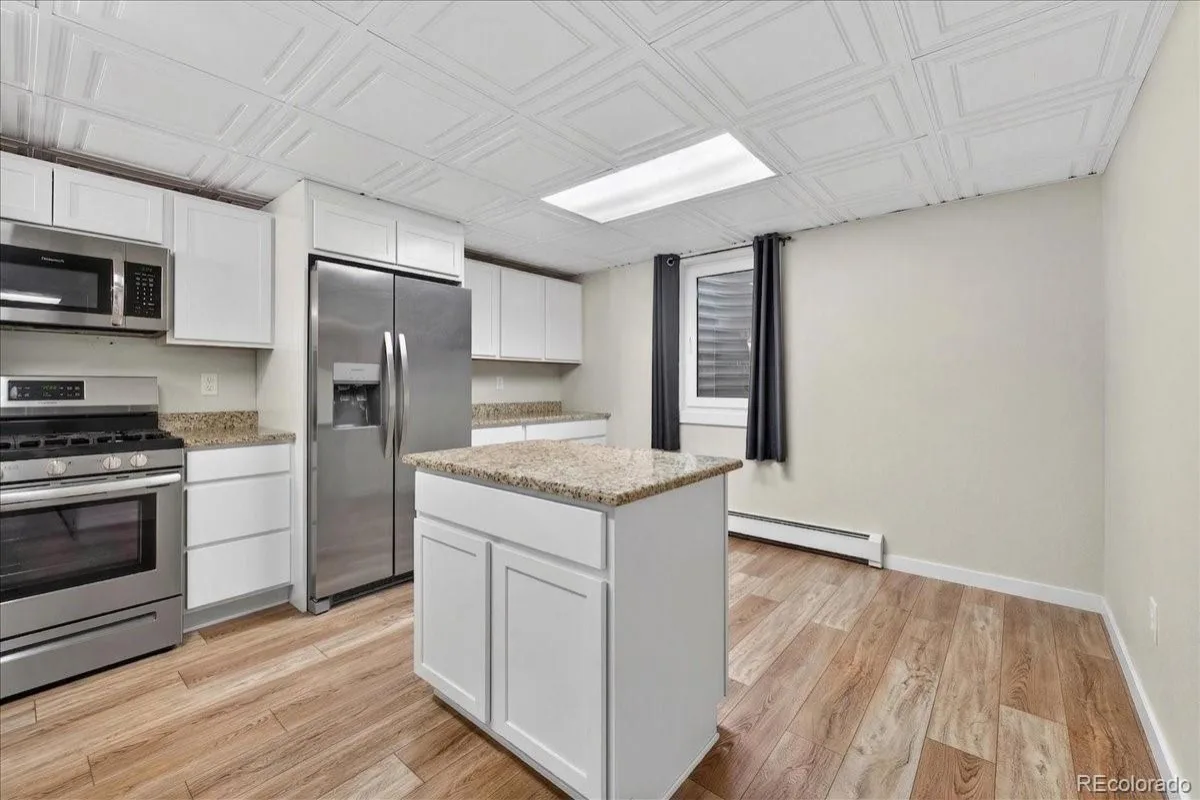 2303 Iris Street Lakewood CO 80215 | MLS #REC2997465 06202026000916 1200 41
