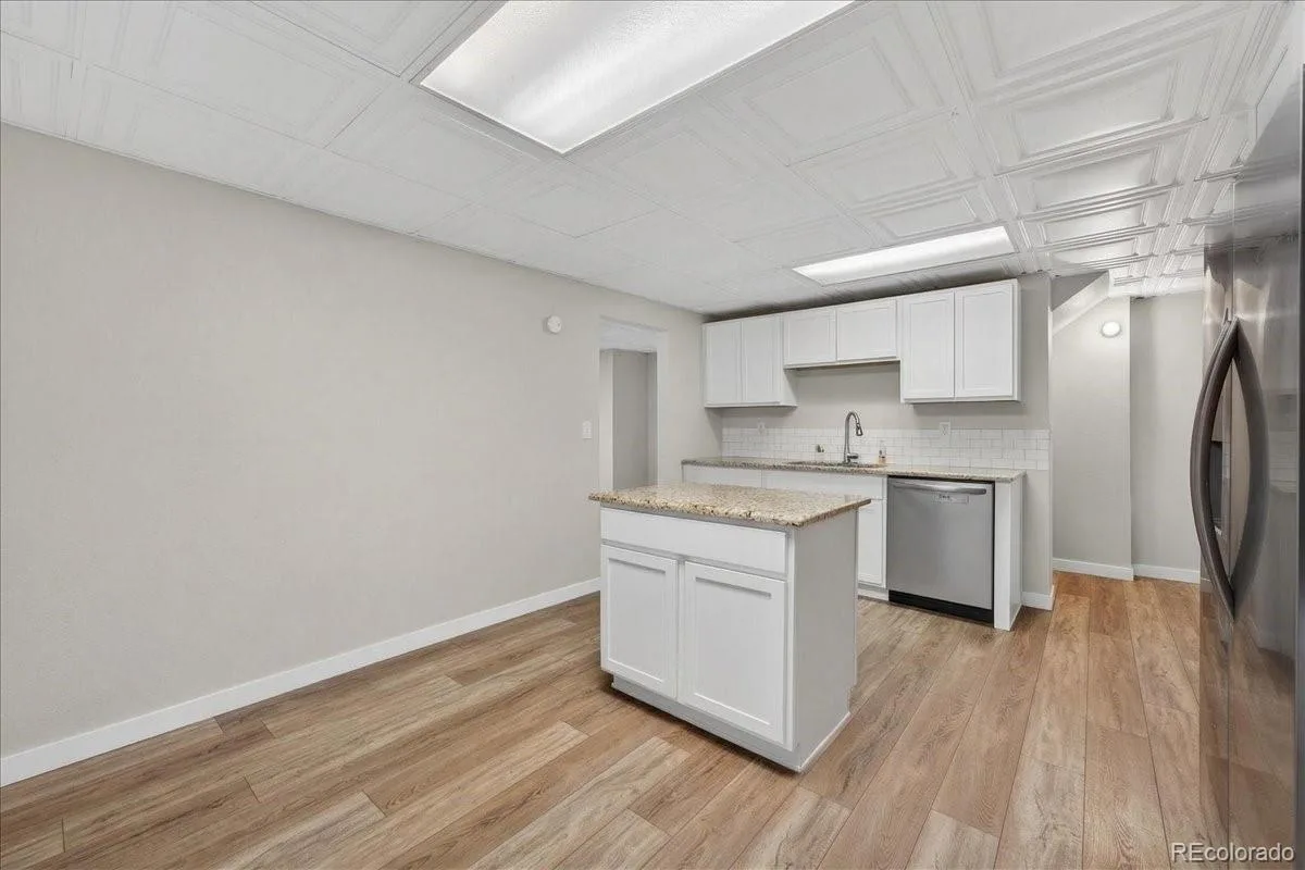 2303 Iris Street Lakewood CO 80215 | MLS #REC2997465 06202026000916 1200 42