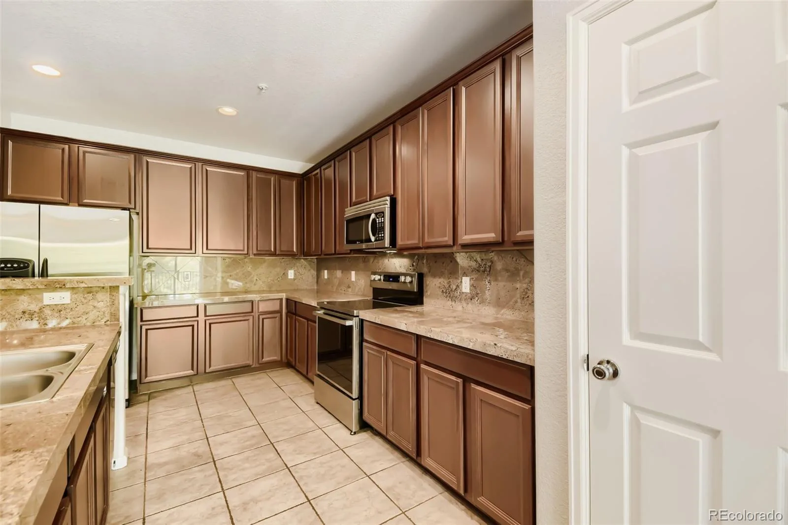 9907 Martin Luther King Boulevard #102 Denver CO 80238 | MLS #REC2999134 06232026201444 1600 2