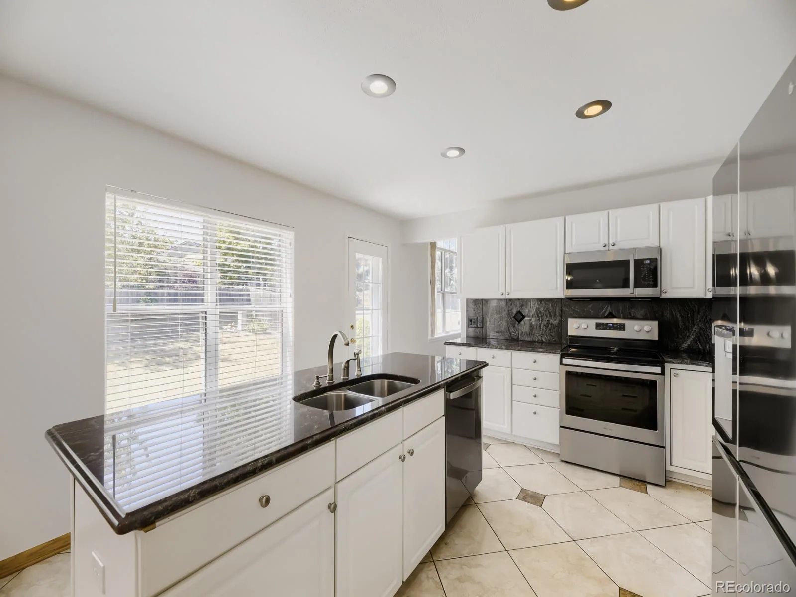 15678 E Quincy Lane Aurora CO 80015 MLS #REC3039895 06202026001224 1600 7