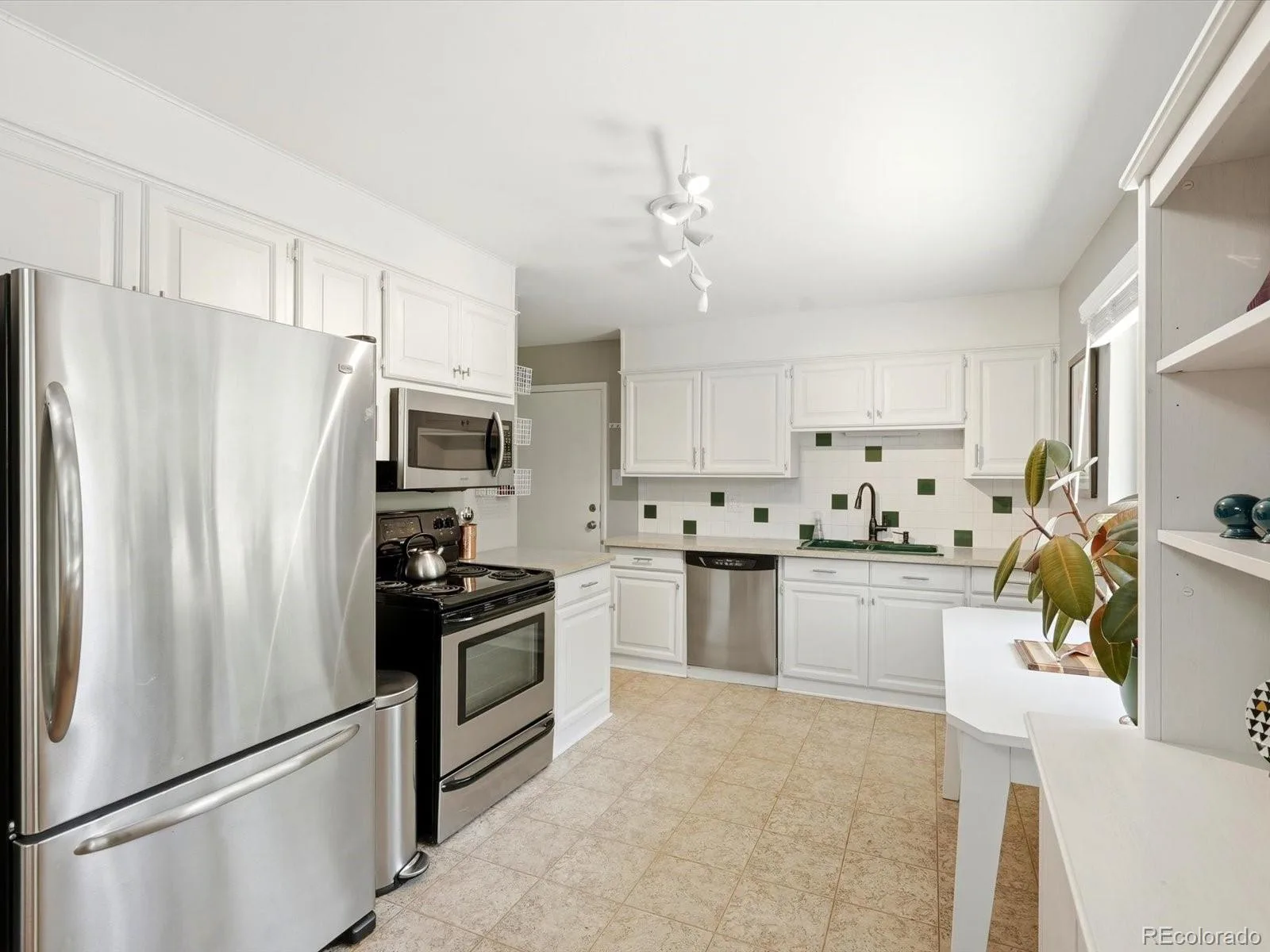 4062 W Greenwood Place Denver CO 80236 MLS #REC3060735 06082026232701 1600 19