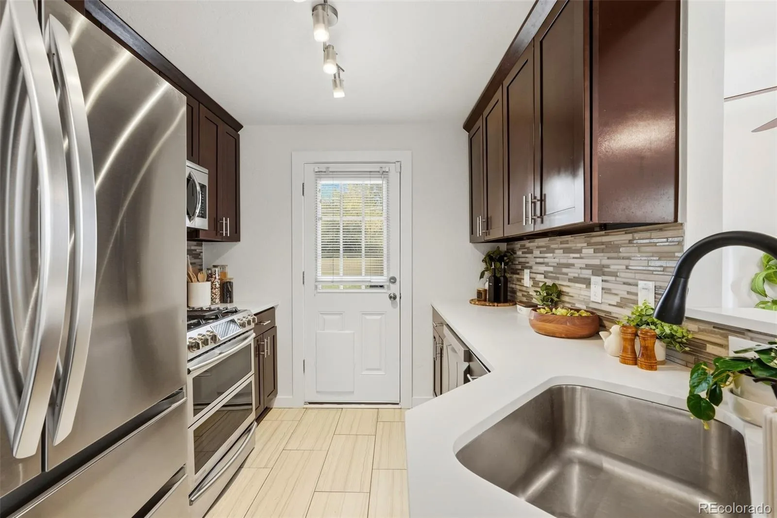 3030 Newport Street Denver CO 80207 | MLS #REC3061623 10092026004935 1600 10
