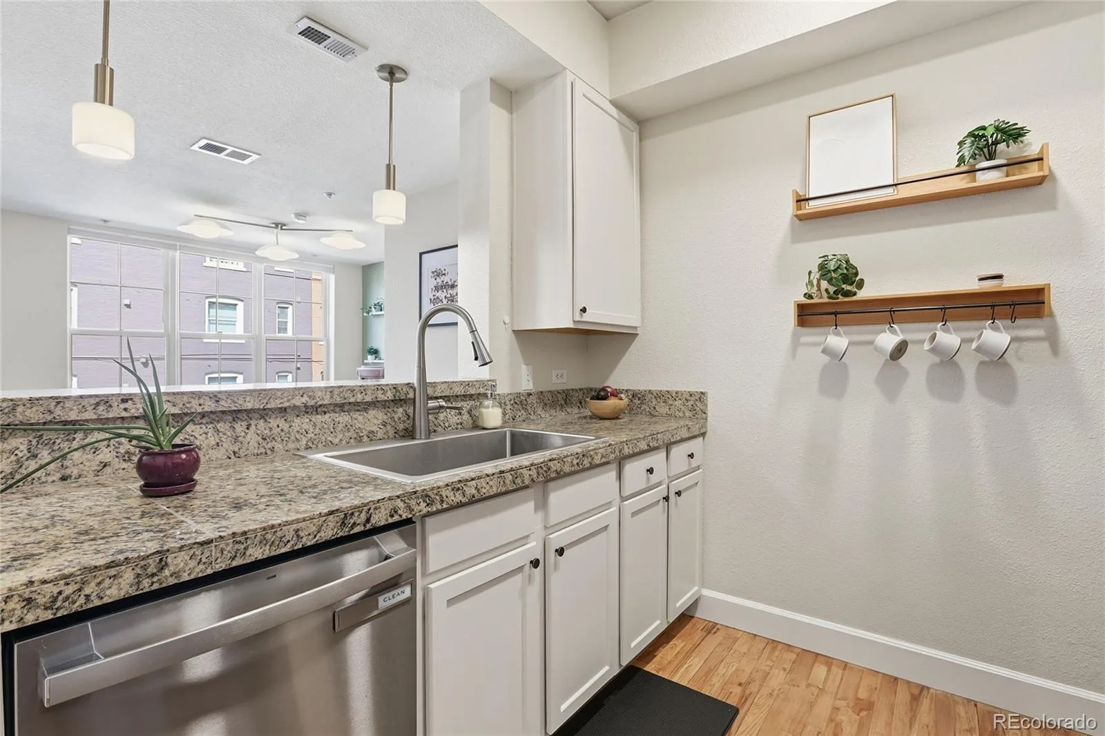1699 N Downing Street #106 Denver CO 80218 MLS #REC3062035 06202026161047 1600 15