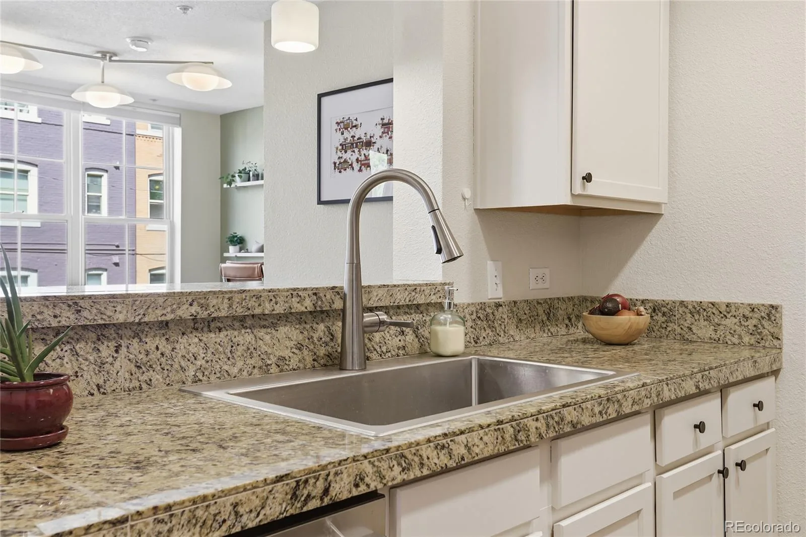 1699 N Downing Street #106 Denver CO 80218 MLS #REC3062035 06202026161047 1600 16