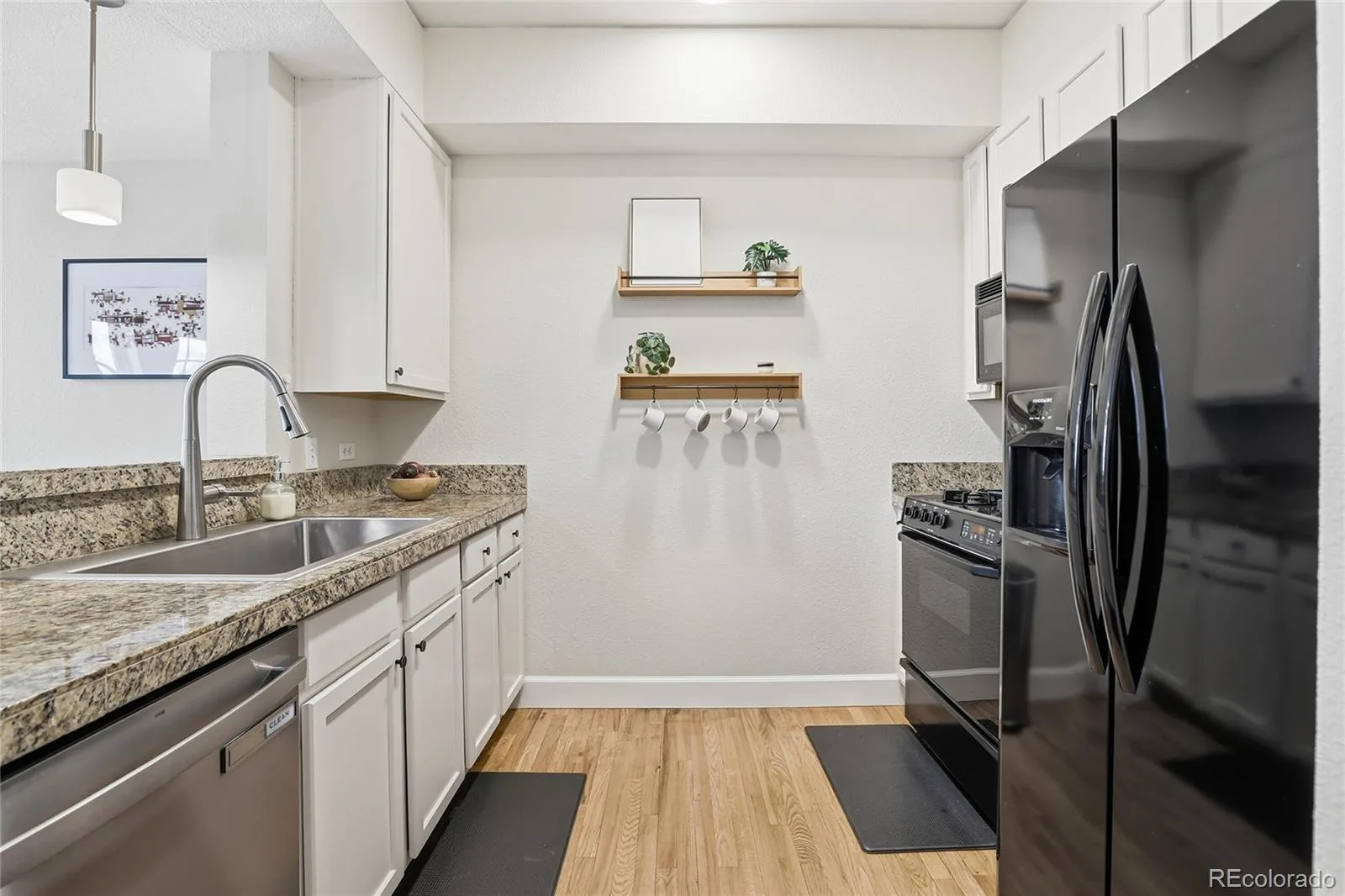 1699 N Downing Street #106 Denver CO 80218 MLS #REC3062035 06202026161047 1600 17