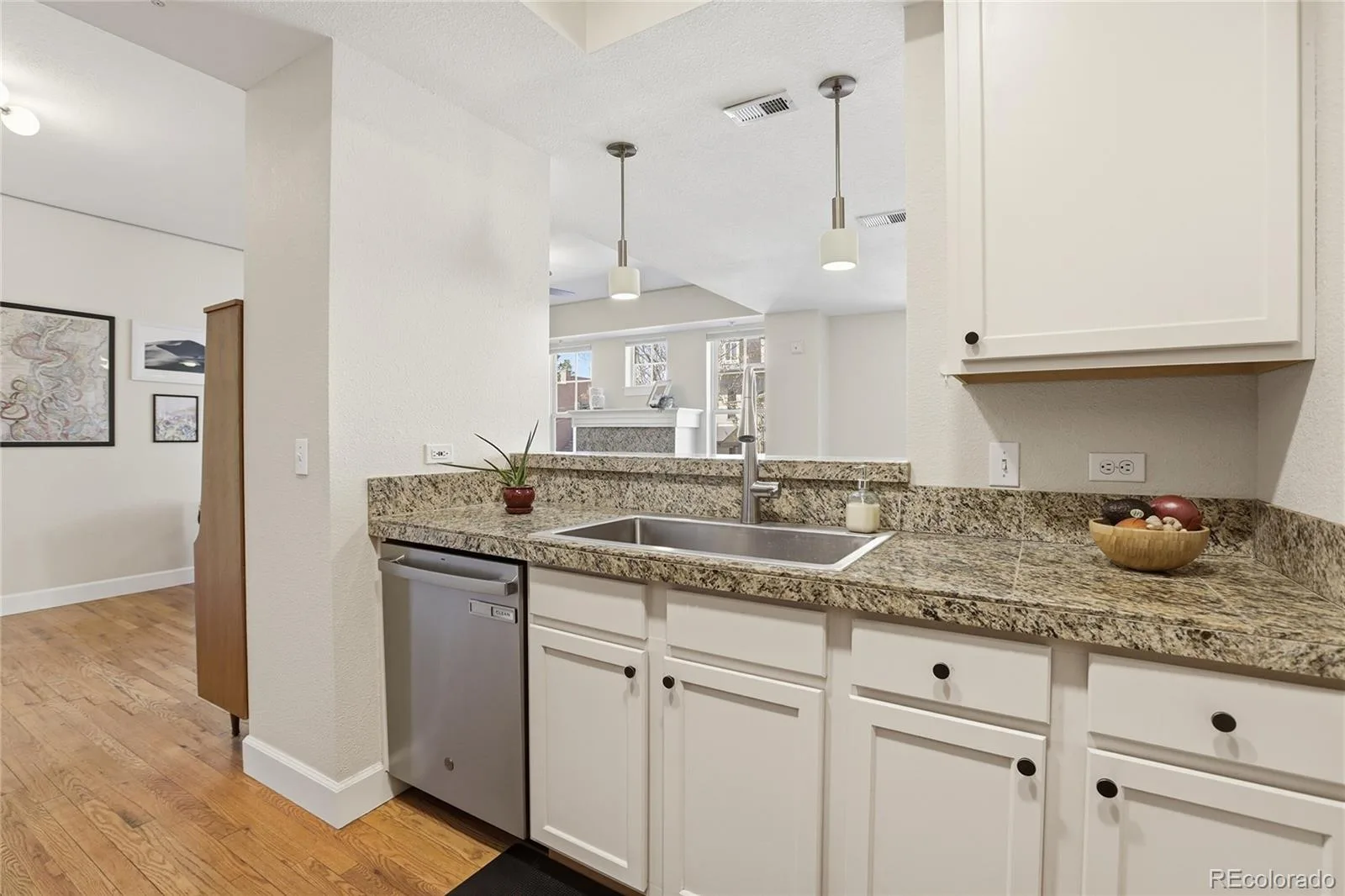 1699 N Downing Street #106 Denver CO 80218 MLS #REC3062035 06202026161047 1600 18