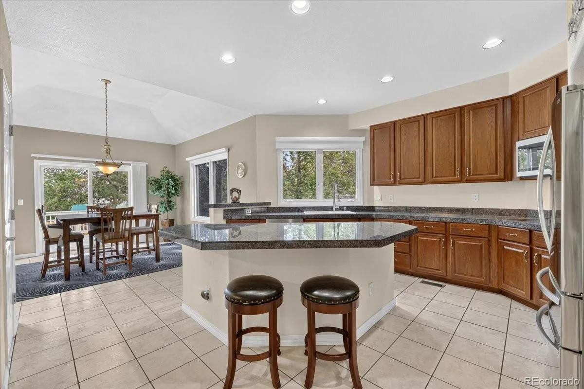 10852 Bobcat Terrace Lone Tree CO 80124 | MLS #REC3062122 08212026133622 1200 12