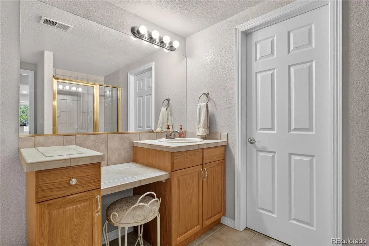 10852 Bobcat Terrace Lone Tree CO 80124 | MLS #REC3062122 08212026133622 1200 39