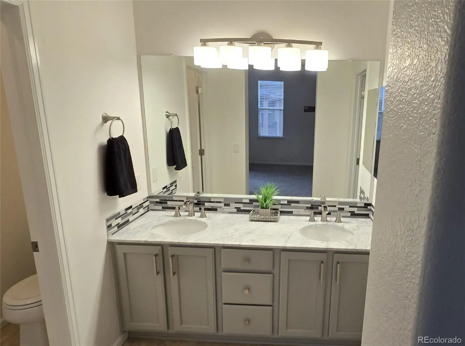 665 W Burgundy Street #A Highlands Ranch CO 80129 | MLS #REC3076077 03042026191449 1600 14