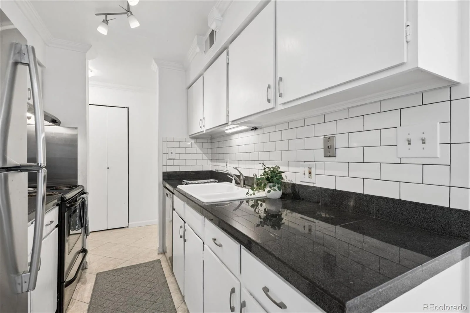 7665 E quincy Avenue #204 #7665 Denver CO 80237 MLS #REC3081321 07242026131007 1600 2