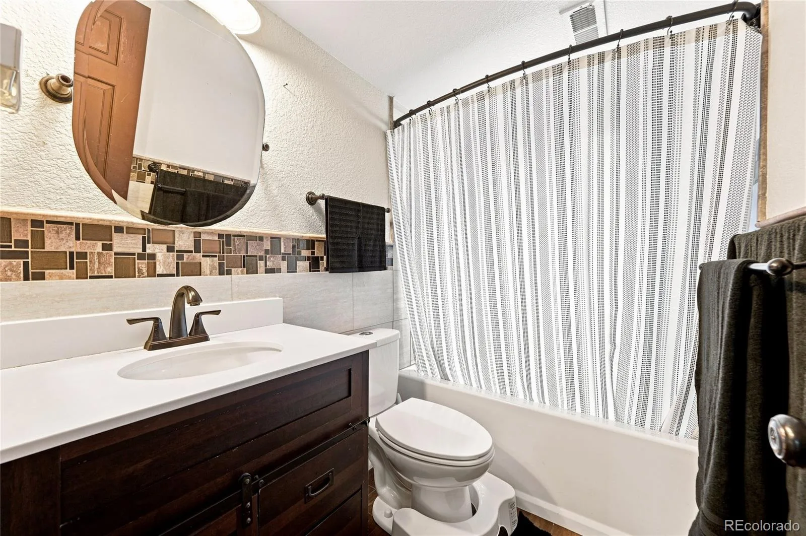 4204 W Roanoke Place Denver CO 80236 | MLS #REC3145037 08122026190302 1600 12