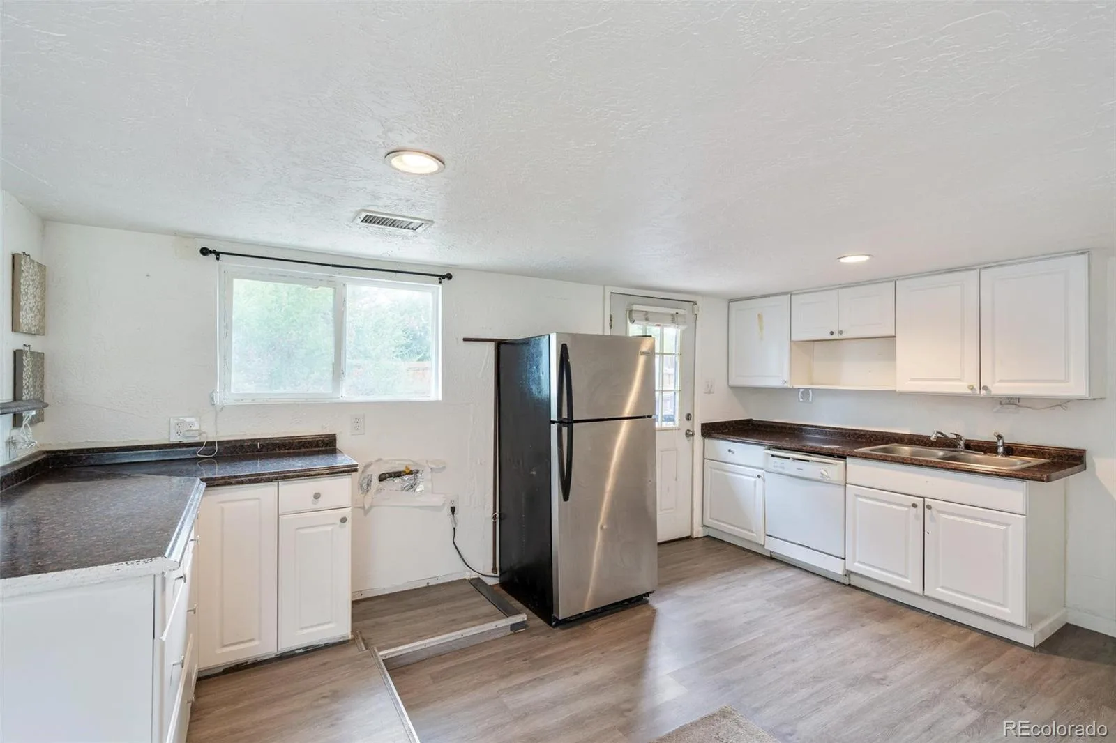 166 Newton Street Denver CO 80219 | MLS #REC3165126 07032026161055 1600 8