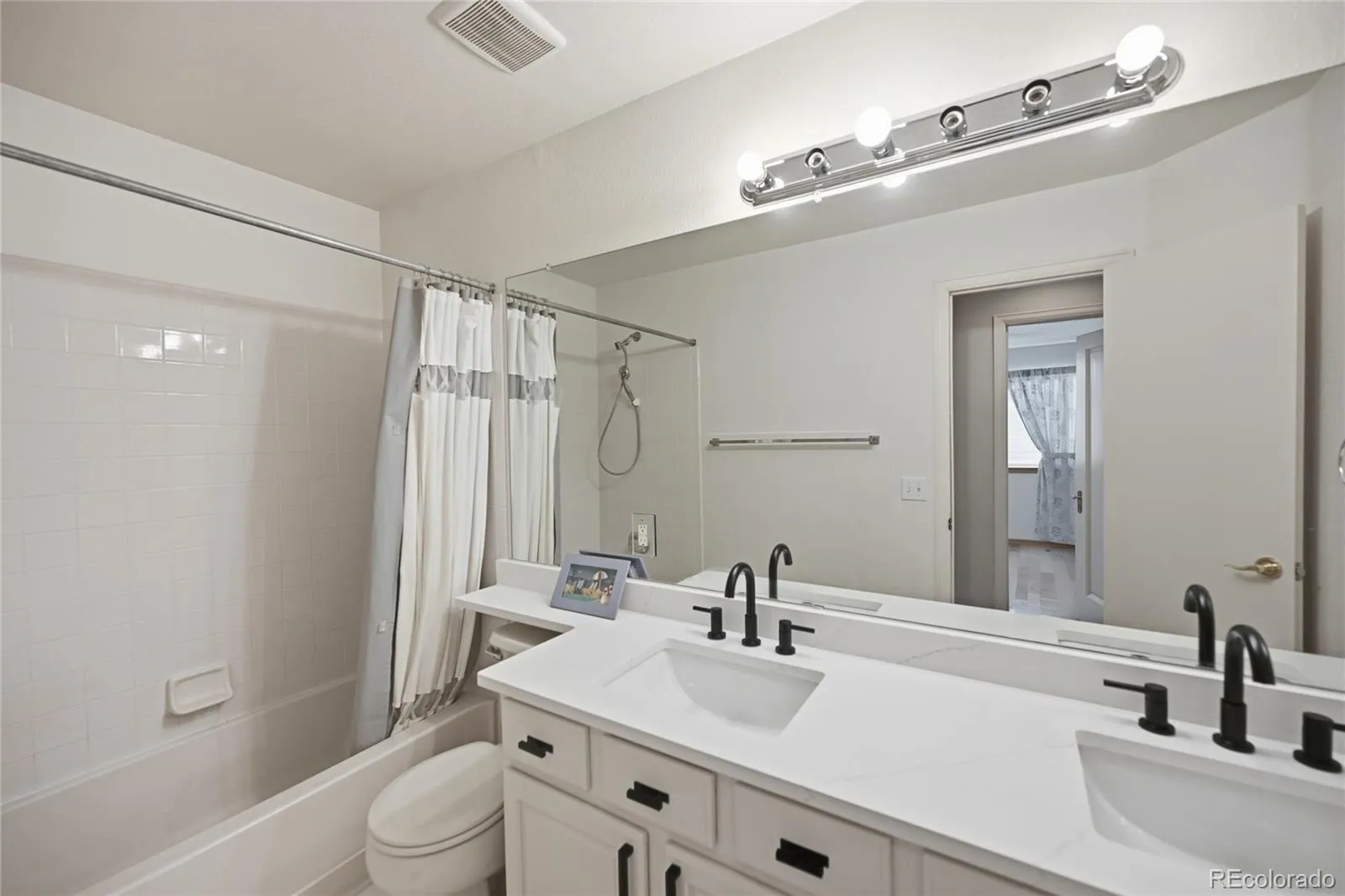 10907 Baxter Drive Parker CO 80134 MLS #REC3166352 05142026234833 1600 22