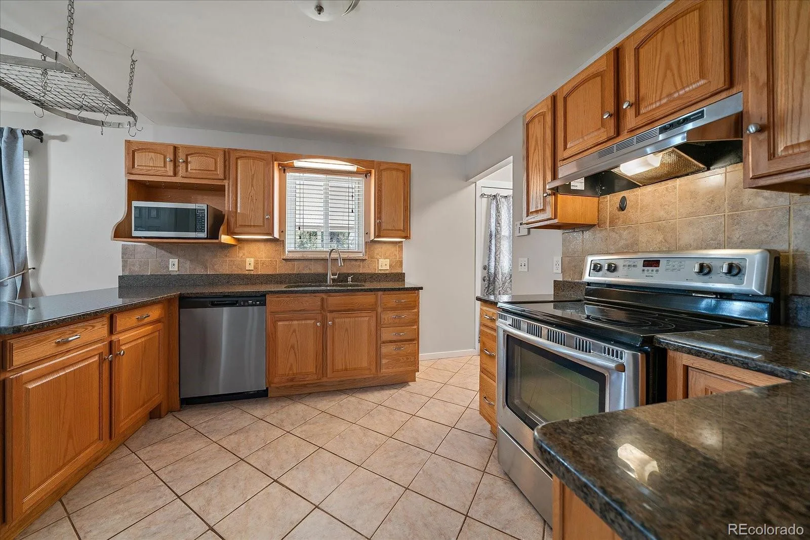 8282 Navajo Street Denver CO 80221 | MLS #REC3248313 08262026004503 1600 11