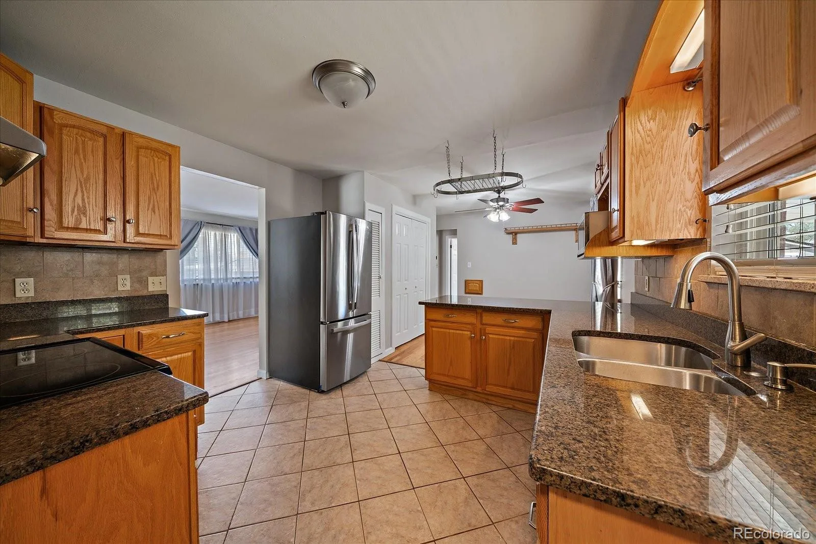 8282 Navajo Street Denver CO 80221 | MLS #REC3248313 08262026004503 1600 12