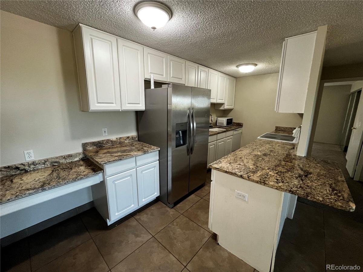 2225 Buchtel Boulevard #901 Denver CO 80210 | MLS #REC3267447 MLS #REC3267447 image #0