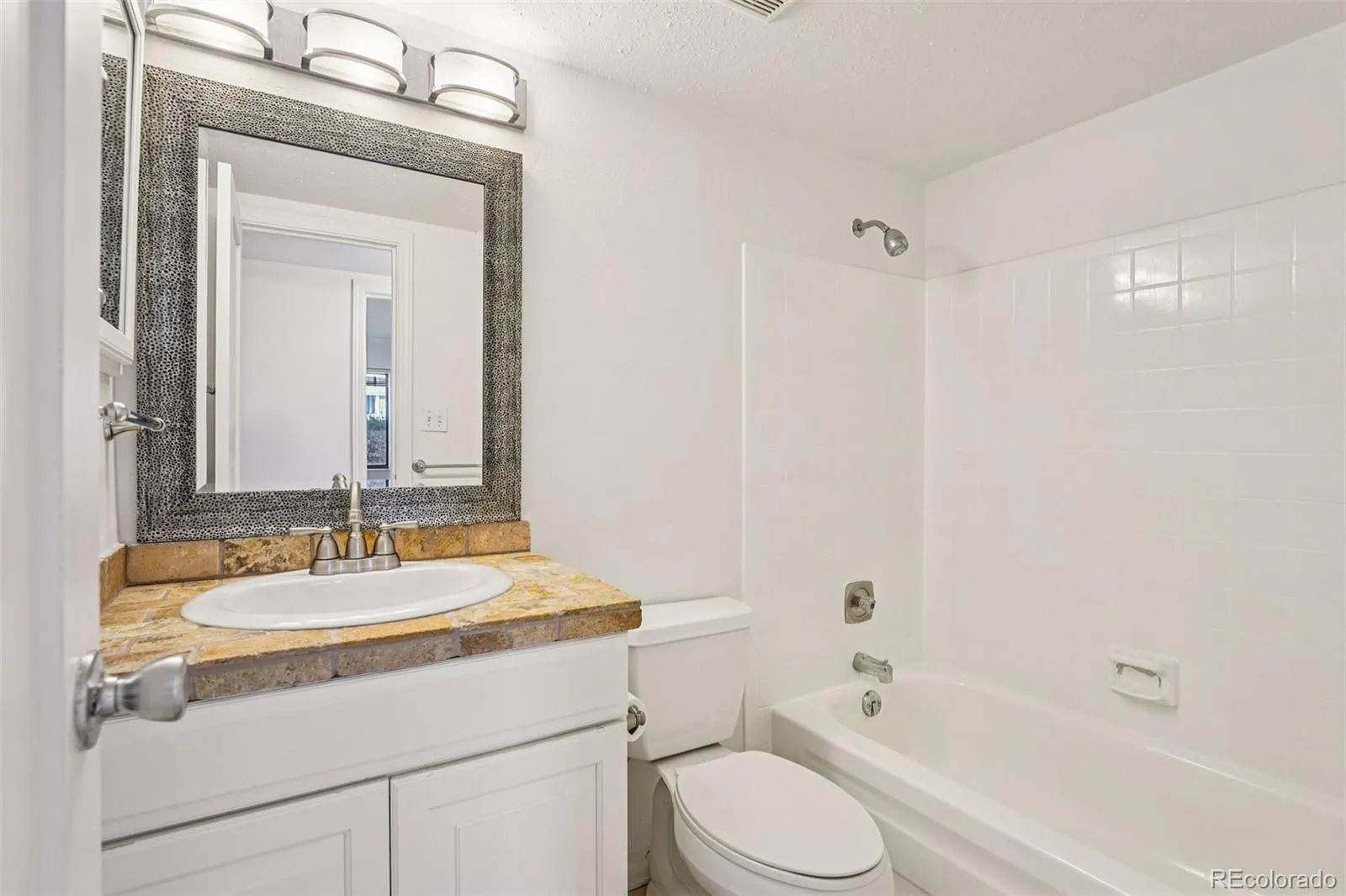 8335 Fairmount Drive #2-103 Denver CO 80247 MLS #REC3286658 05052026190955 1600 4