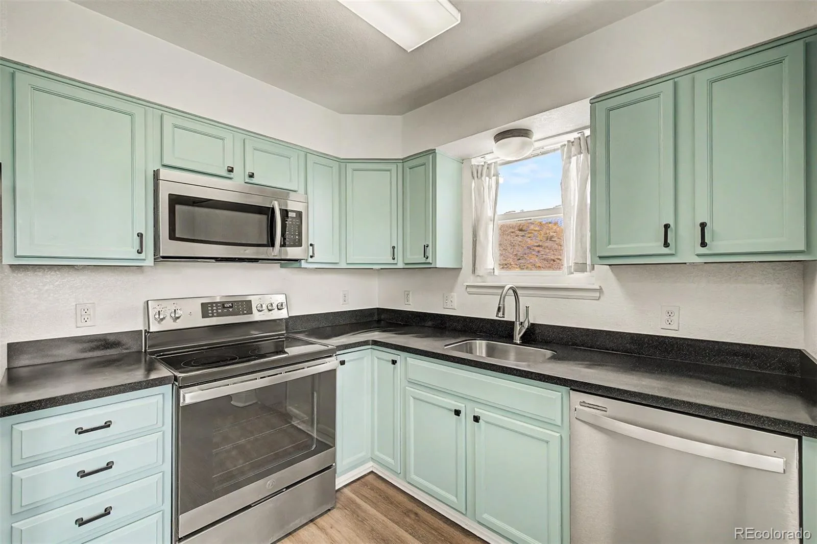 1629 S Deframe Street #B8 Denver CO 80228 | MLS #REC3312369 08232026185409 1600 12