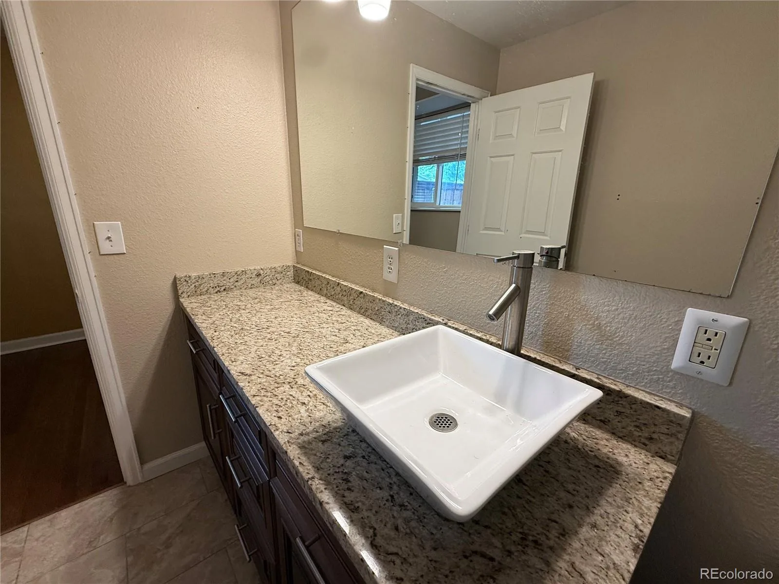 8235 W Florida Avenue Lakewood CO 80232 MLS #REC3400797 06212026034807 1600 14