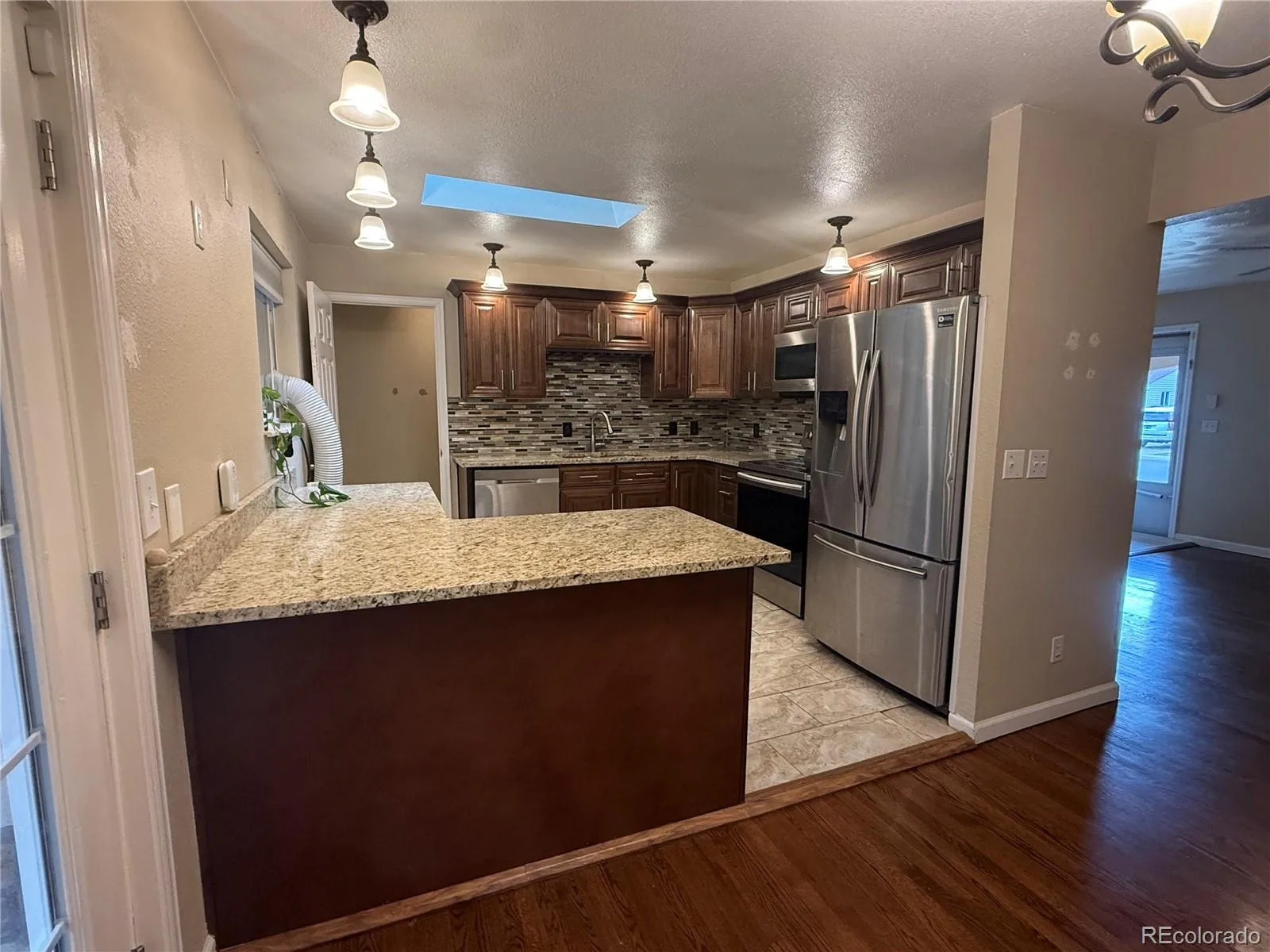 8235 W Florida Avenue Lakewood CO 80232 MLS #REC3400797 06212026034807 1600 6