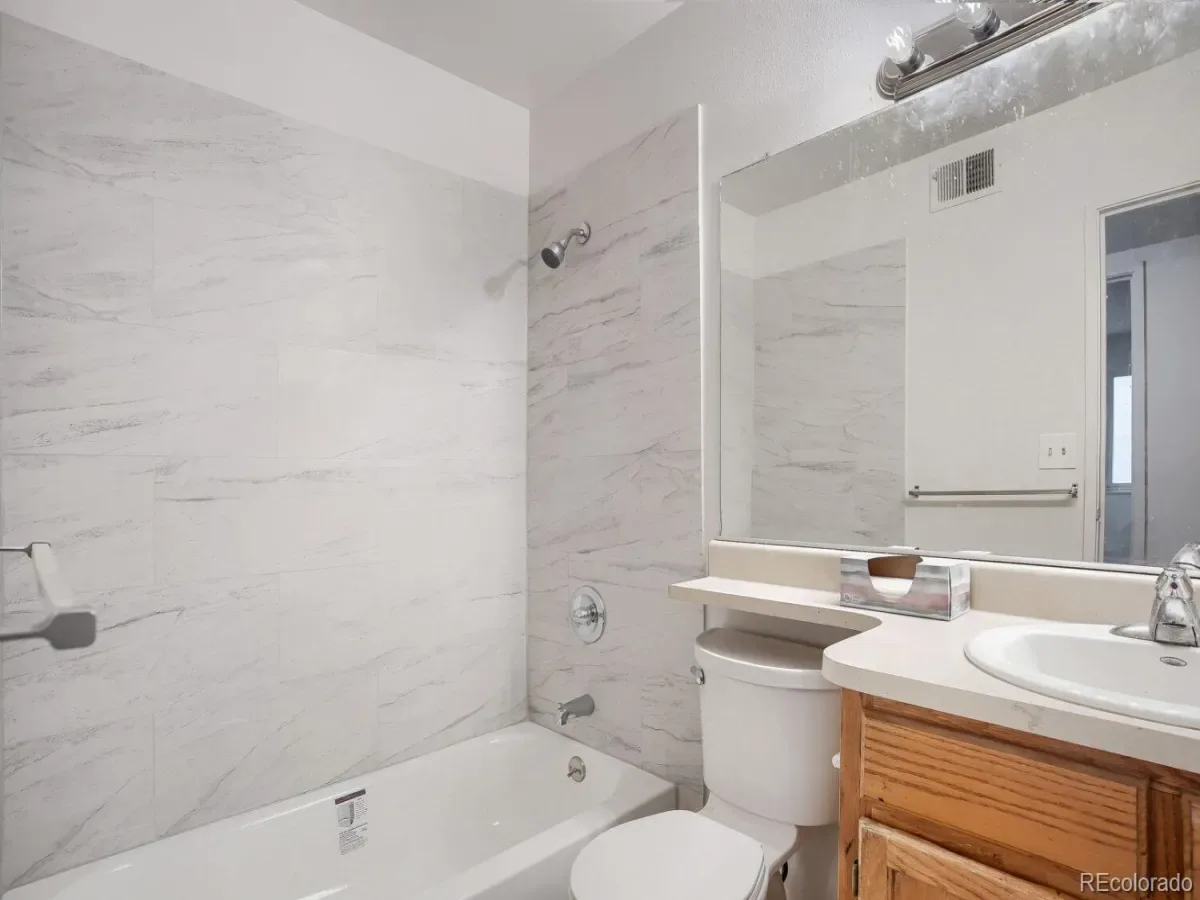 8335 Fairmount Drive #2-204 Denver CO 80247 MLS #REC3435031 03092026195624 1200 12