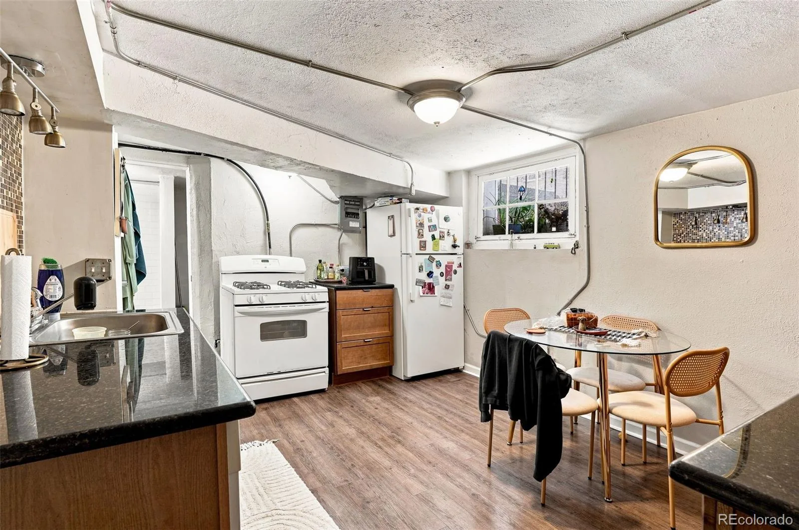 1215 E 14th Avenue Denver CO 80218 | MLS #REC3436992 09222026145843 1600 12