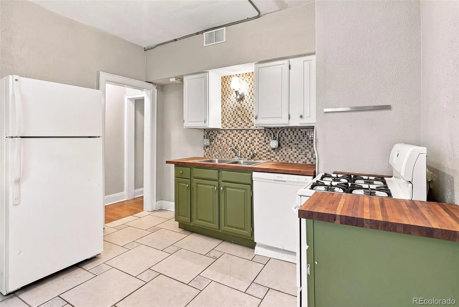 1215 E 14th Avenue Denver CO 80218 | MLS #REC3436992 09222026145843 1600 7