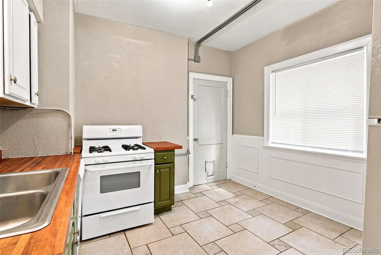 1215 E 14th Avenue Denver CO 80218 | MLS #REC3436992 09222026145843 1600 8