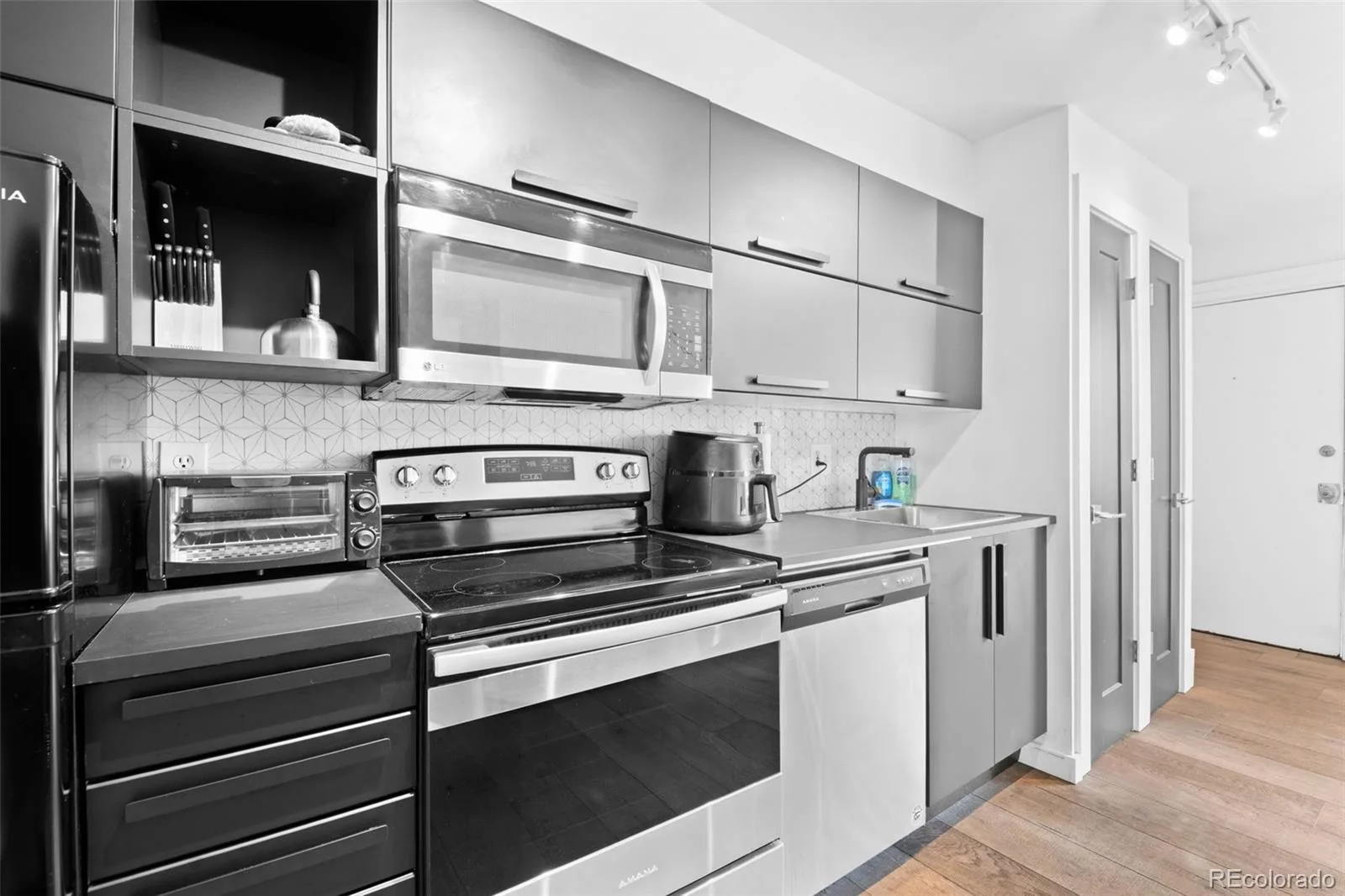 1140 N Downing Street #305 Denver CO 80218 | MLS #REC3454305 08212026153048 1600 13