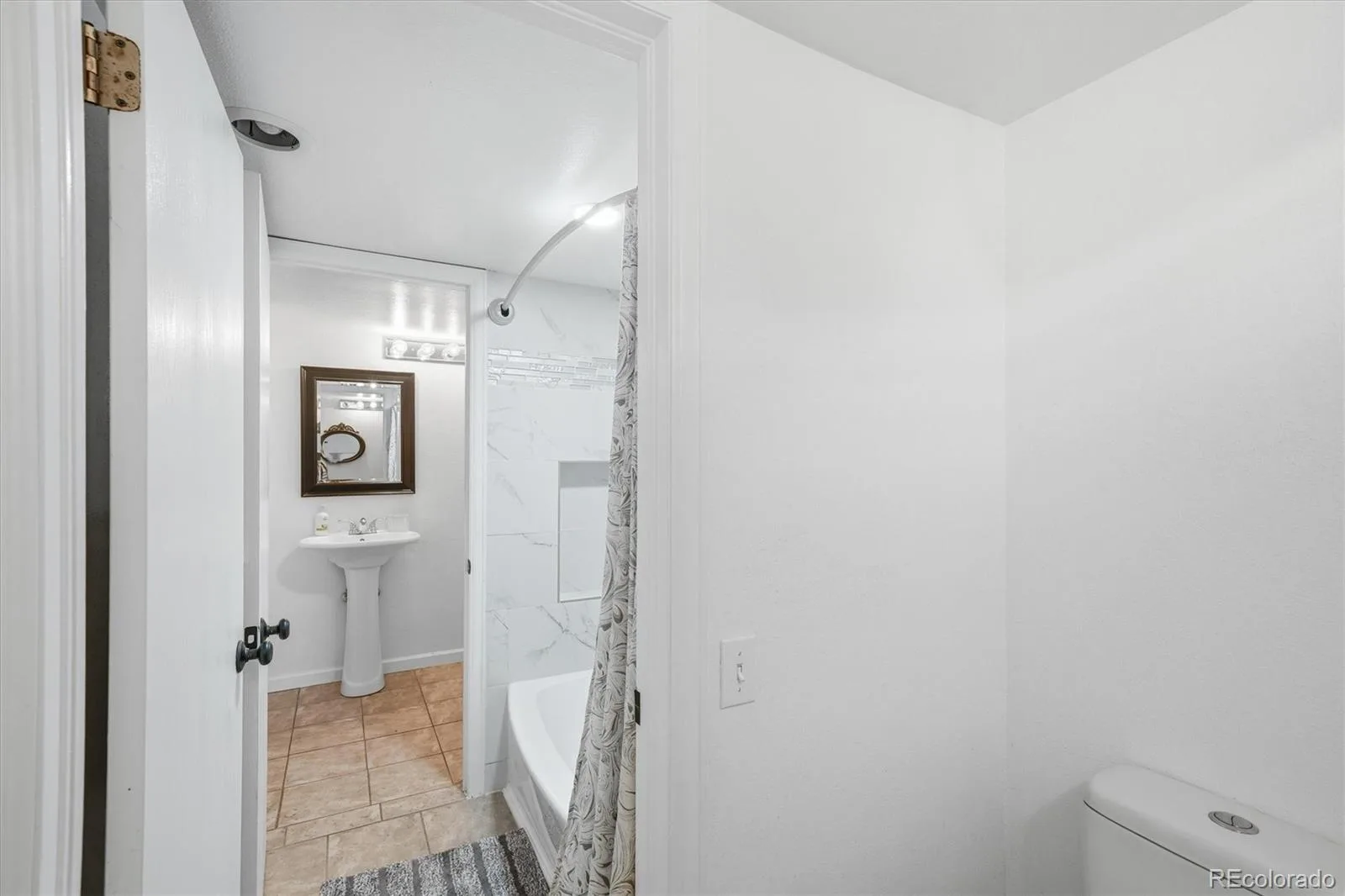 13902 E Stanford Circle #A06 Aurora CO 80015 MLS #REC3458677 06142026203850 1600 18