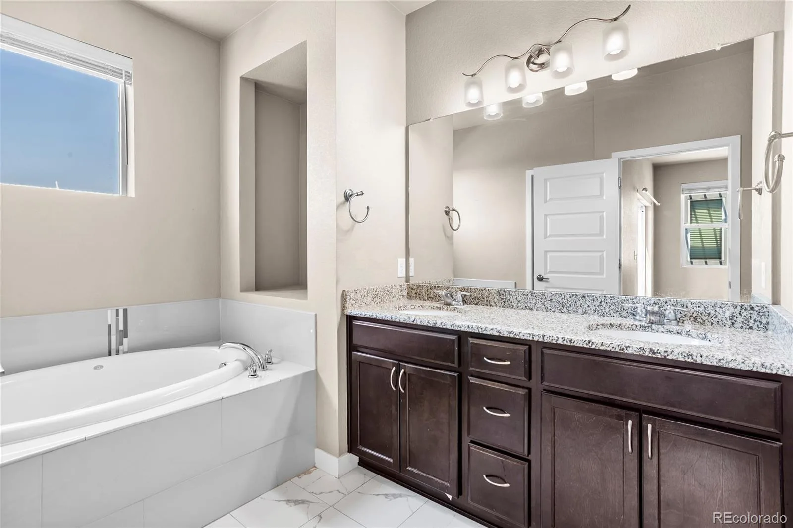 6647 N Pecos Street Denver CO 80221 | MLS #REC3472178 07252026005455 1600 23