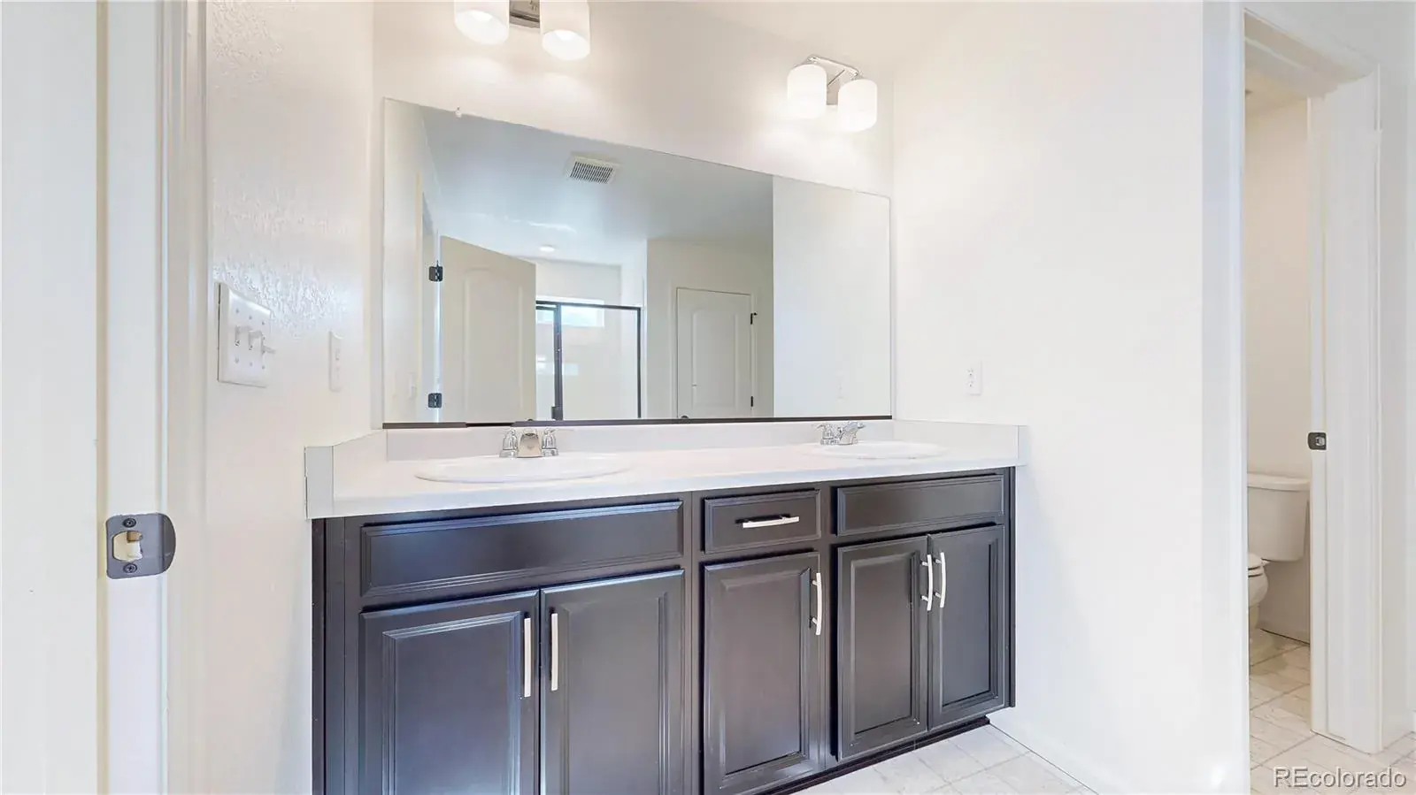 27584 E 6th Drive Aurora CO 80018 | MLS #REC3567229 02112026200537 1600 12
