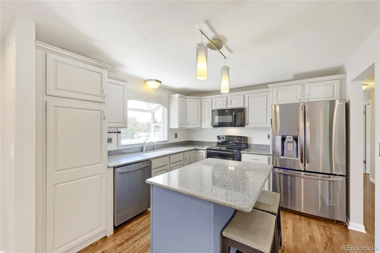 8614 W 65th Place Arvada CO 80004 | MLS #REC3578729 08252026012445 1600 12