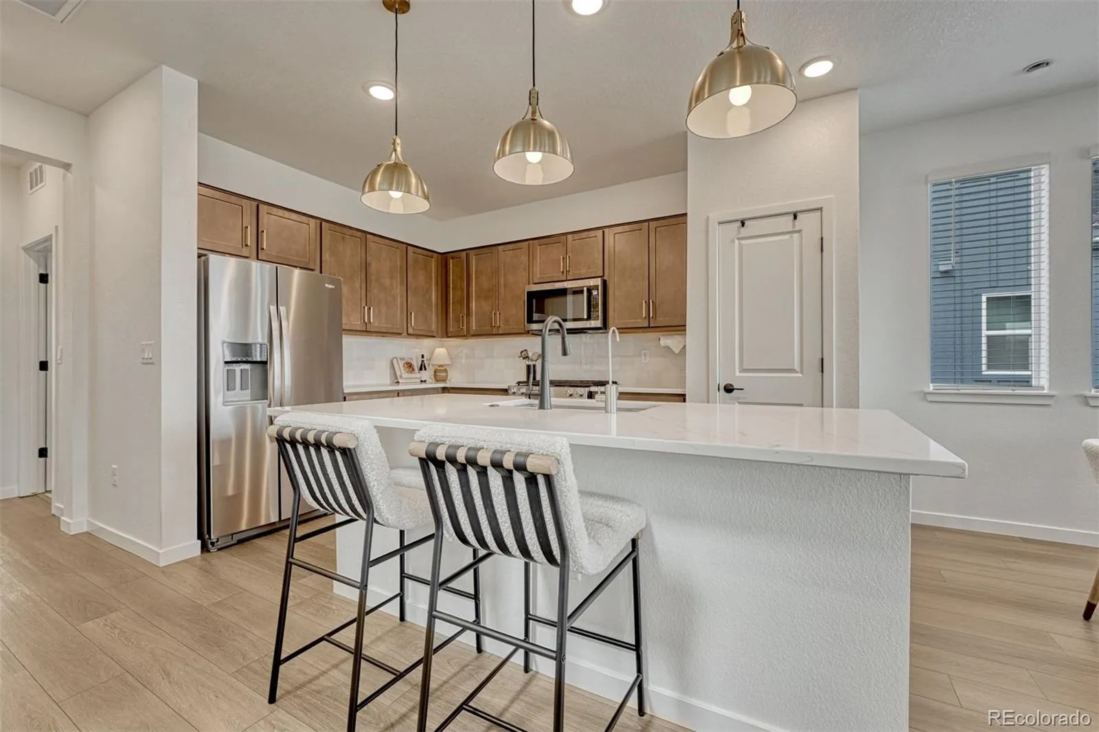8673 Middle Fork Street Littleton CO 80125 | MLS #REC3655489 04302026001807 1600 6