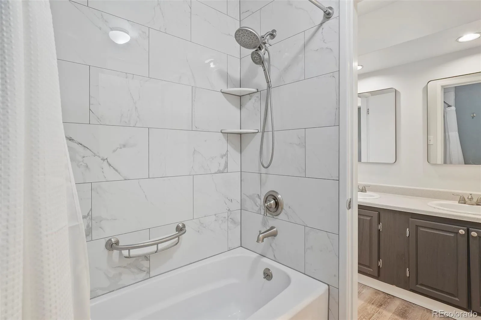1681 S Arbutus Place Lakewood CO 80228 | MLS #REC3741602 08292026013623 1600 26