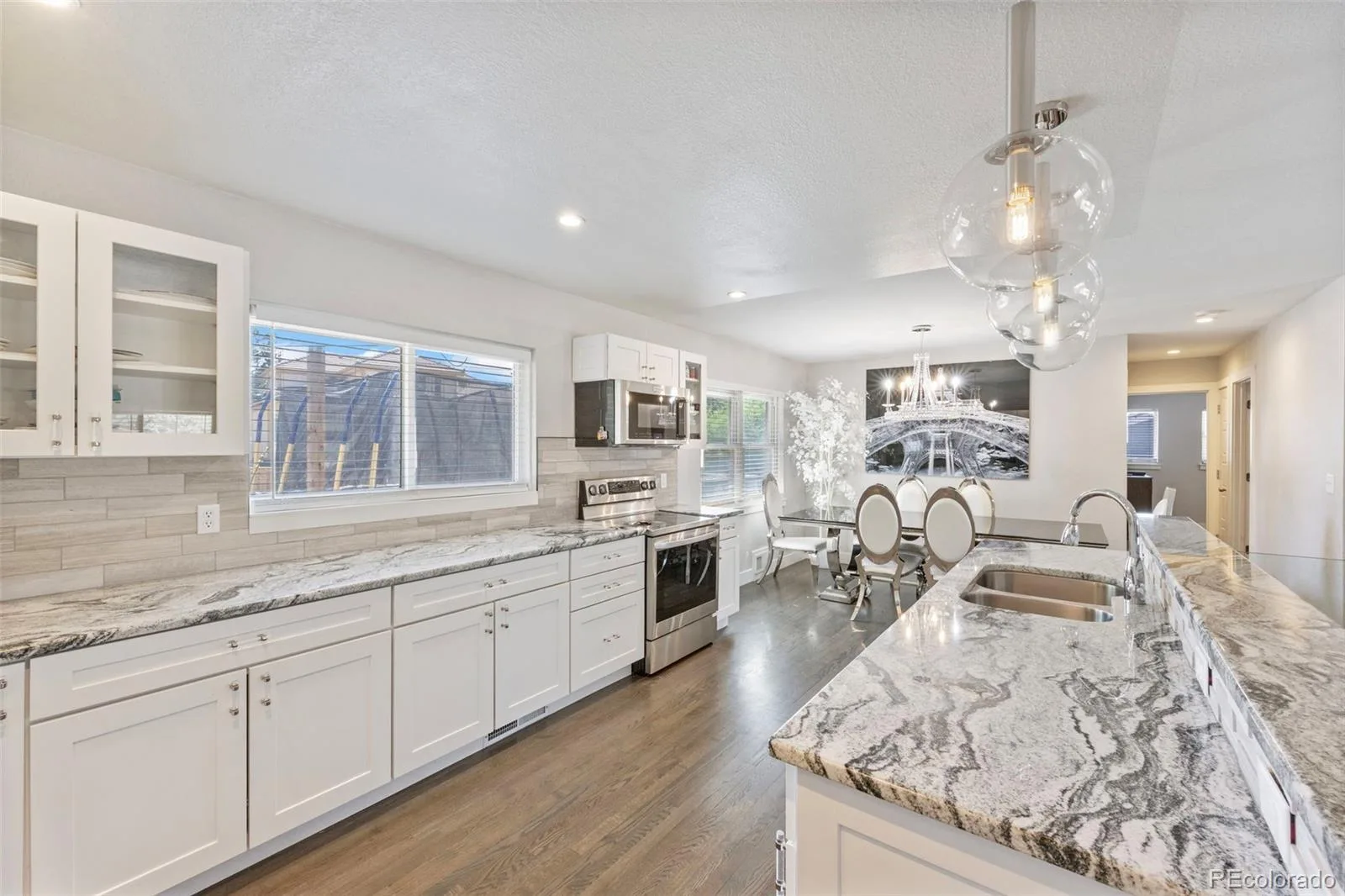 3290 S Lowell Boulevard Denver CO 80236 | MLS #REC3763560 10012026014851 1600 11