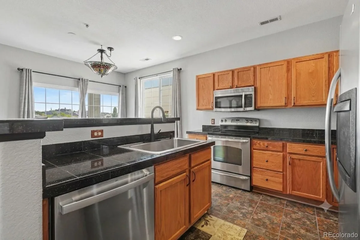 8952 Fox Drive #7-201 Thornton CO 80260 | MLS #REC3828396 08162026050707 1200 15
