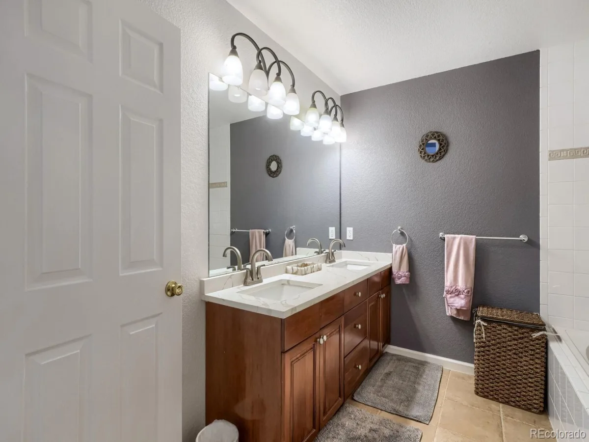 4590 S Auckland Court Aurora CO 80015 | MLS #REC4009349 08142026184945 1200 14