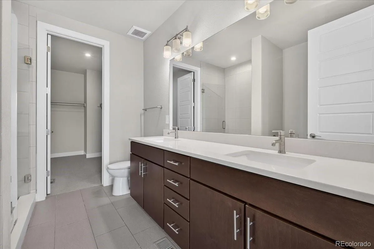 711 E 24th Avenue Denver CO 80205 | MLS #REC4081888 08312026220405 1200 21