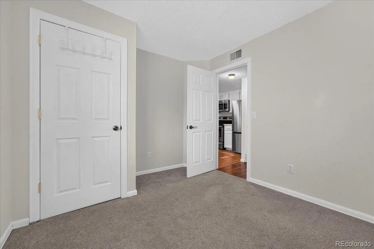 982 S Dearborn Way #10 Aurora CO 80012 | MLS #REC4095871 08192026134601 1200 14